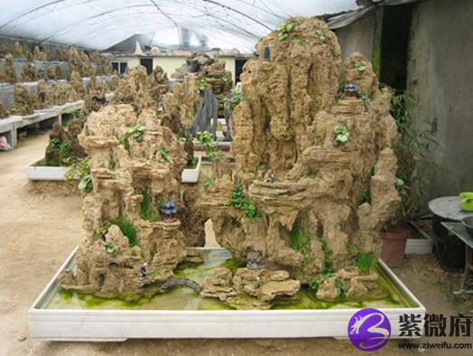 商场门口摆放假山盆景有什么作用